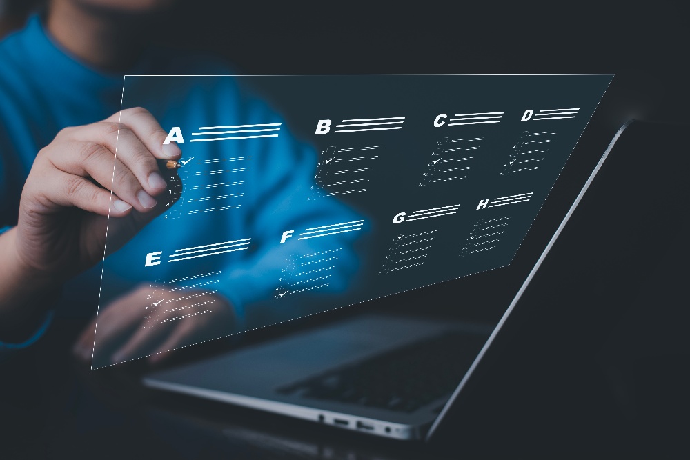 businessman-using-laptop-taking-assessment-questionnaire-evaluation-online-survey-online-exam-choosing-right-answer-exam-by-filling-out-online-survey-formanswer-test-questions-1