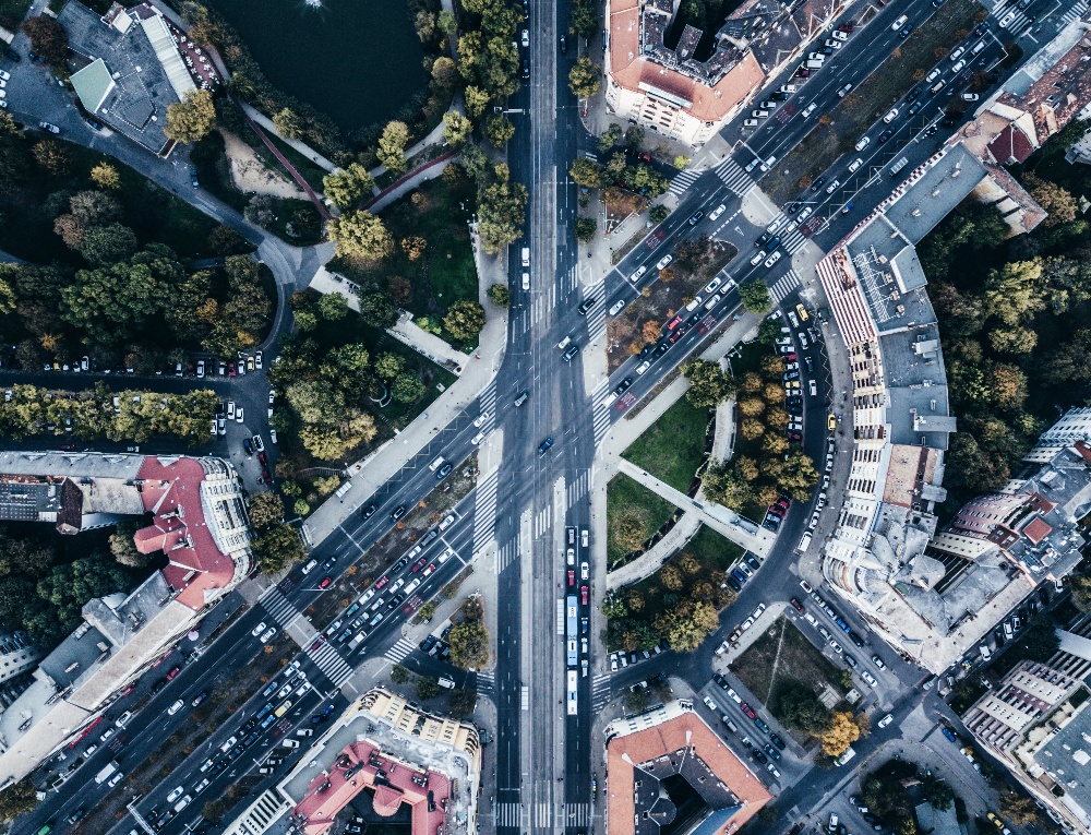 aerial-drone-shot-urban-city-busy-road-intersection-1